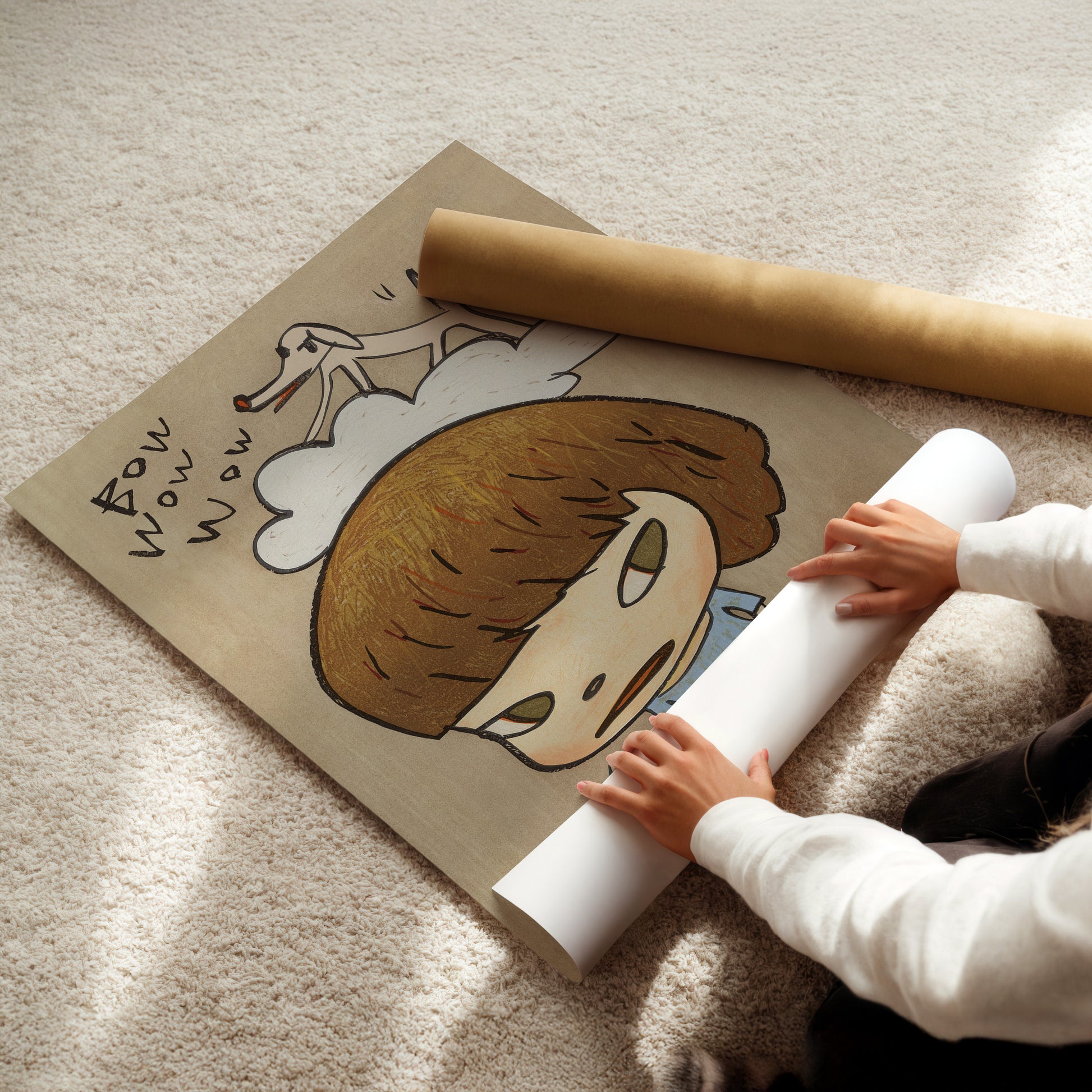 a little girl sitting on the floor holding a roll of paper