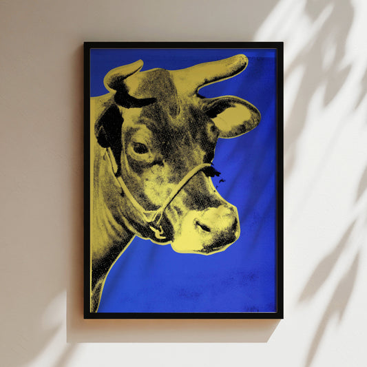 a picture of a cow on a wall