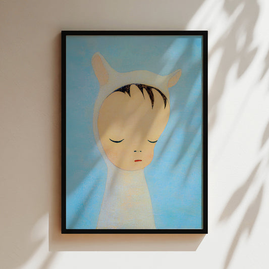 a painting of a child's head is shown on a wall