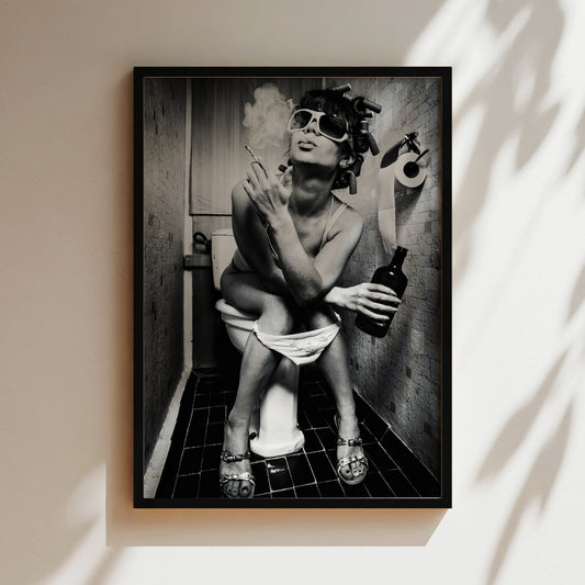 A black and white image of a woman sitting on a toilet in a bathroom, smoking a cigarette and holding a bottle.