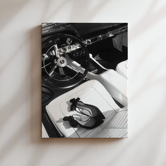 a black and white photo of a car interior