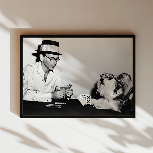 a black and white photo of a man in a hat