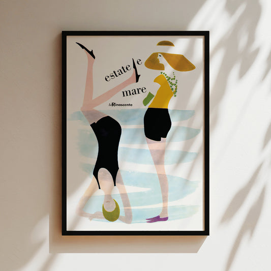a picture of two women in bathing suits hanging on a wall