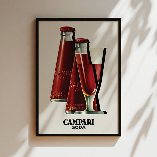 The image is a framed vintage advertisement for Campari soda, featuring two red bottles of Campari soda with a glass of the same red liquid in the background.
