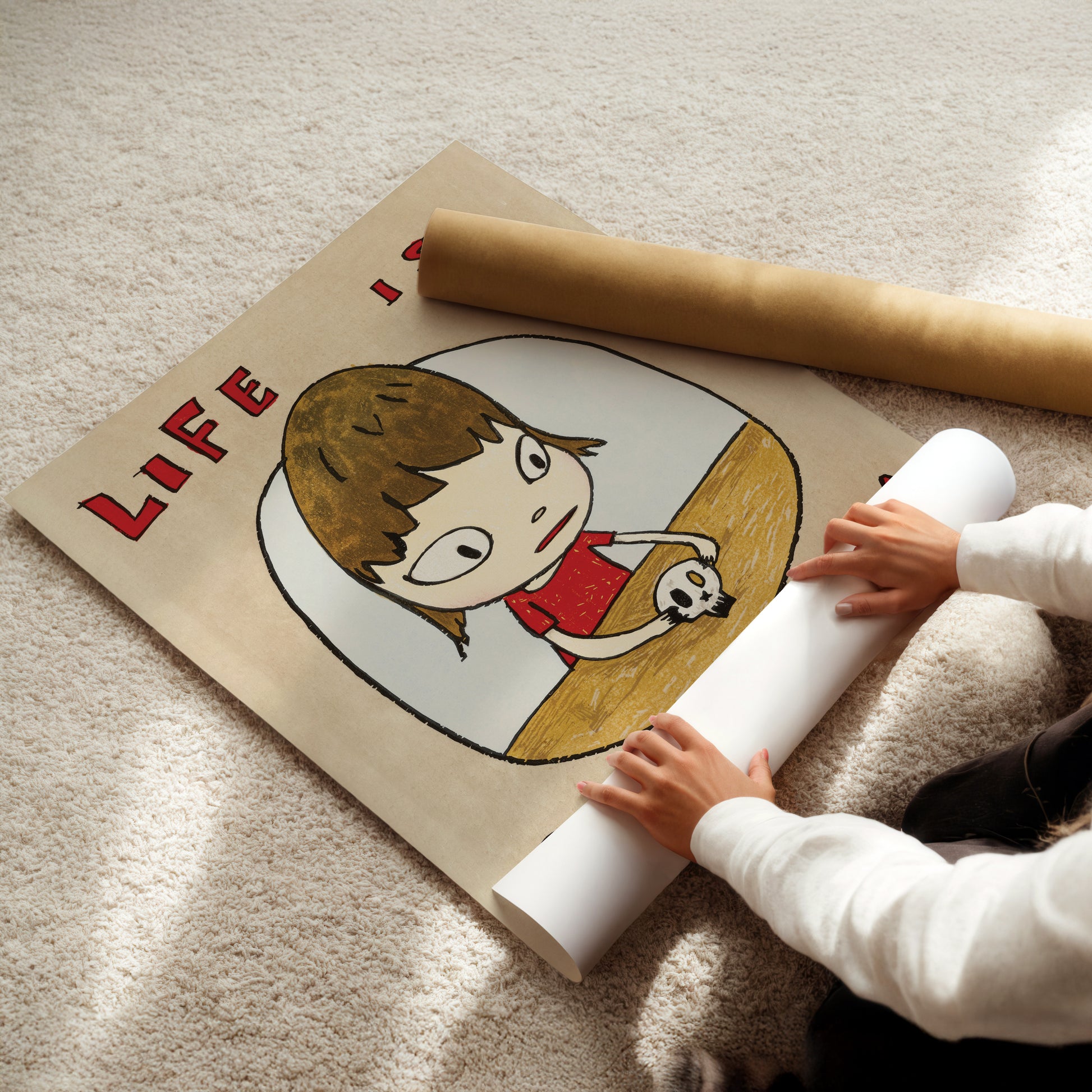 a child is playing with a book on the floor