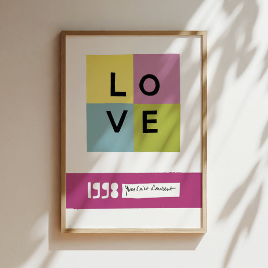 a framed poster with the word "LOVE" prominently displayed in the center.