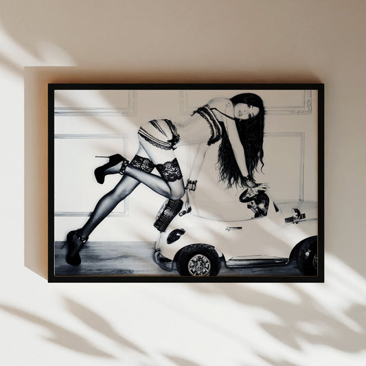 a black and white photo of a woman in short shorts