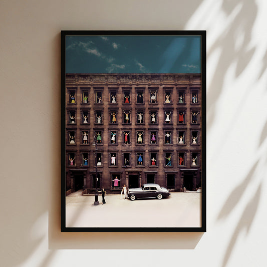 a picture of a building with a car parked in front of it