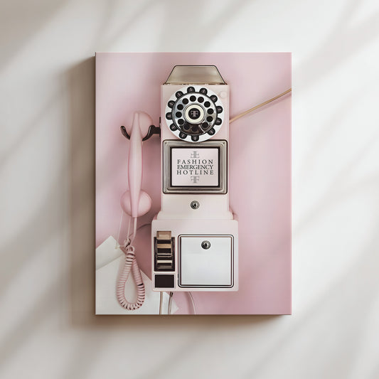 A vintage pink rotary phone with a dial and a keypad, along with a corded telephone receiver, is displayed against a pink background.