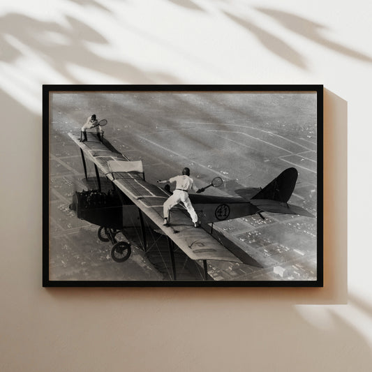 a black and white photo of a fighter jet