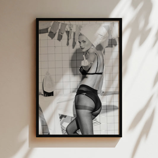 a black and white photo of a woman in lingerie