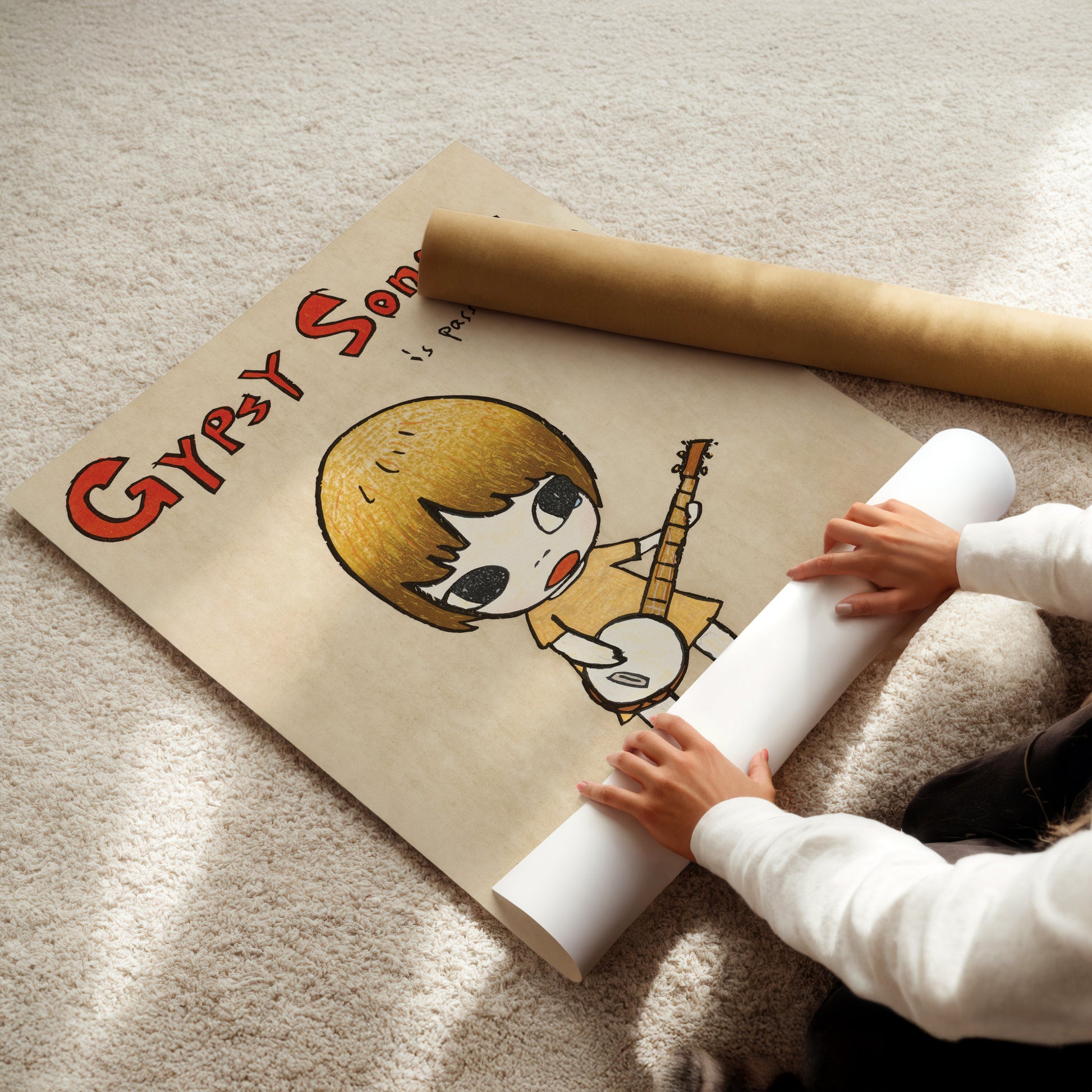 a little girl sitting on the floor reading a book