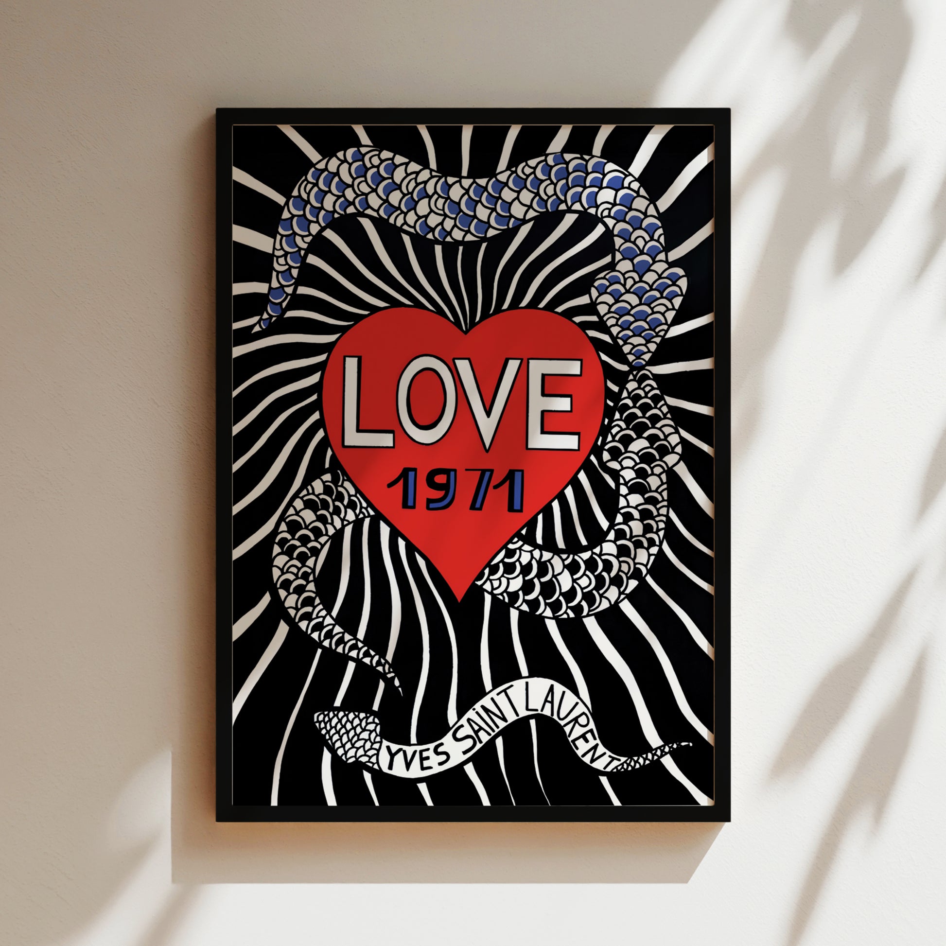 The image is a framed poster with a black and white zebra-like background, a red heart in the center, and a snake-like pattern around it. The text "LOVE 1971" is prominently displayed in the center of the poster.