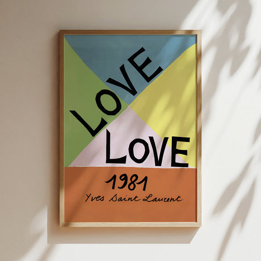 A framed poster with the text "LOVE" in large letters, surrounded by a colorful geometric design.