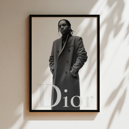 A black and white portrait of a person wearing a coat, with the word "Dior" displayed below the image.