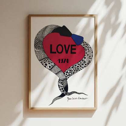 a framed artwork with a red heart-shaped design and a snake-like pattern. The word "LOVE" is prominently displayed in the center of the heart.