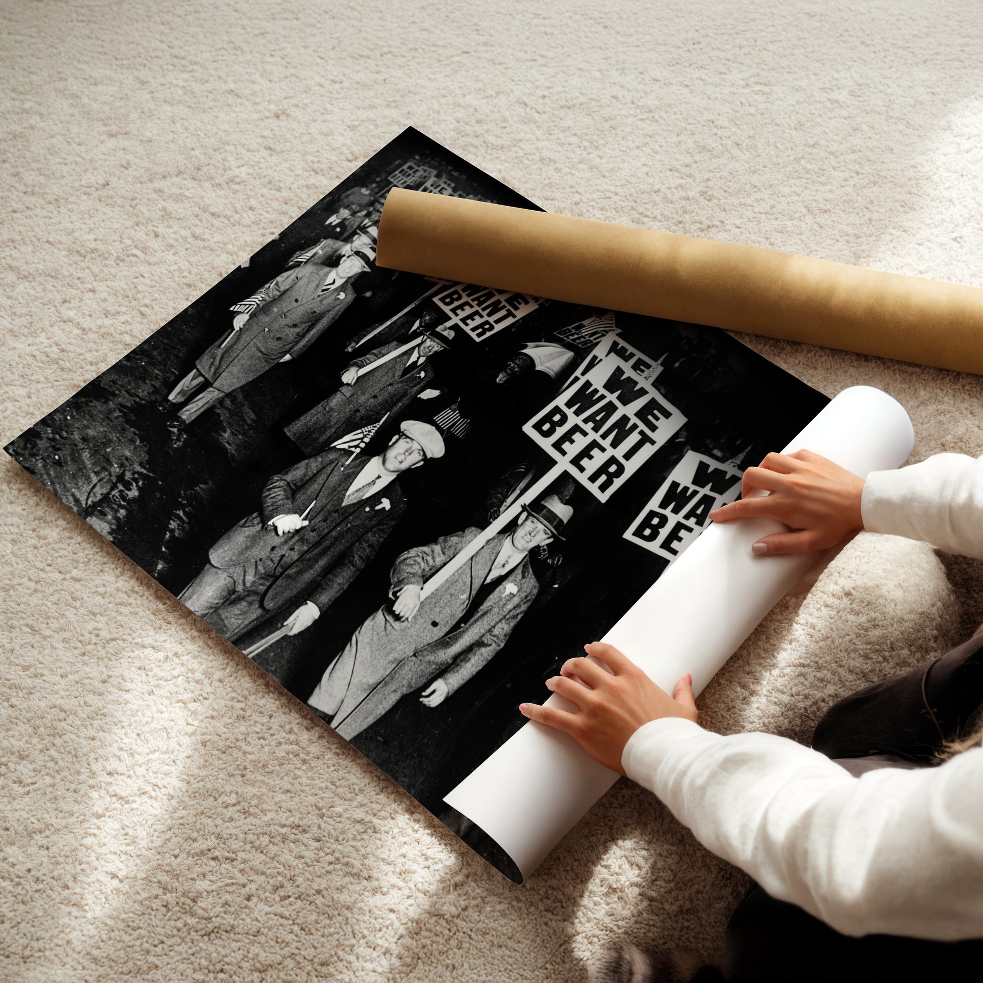 a young child is playing with a paper roll