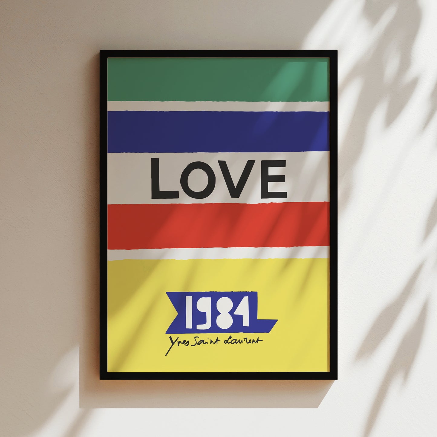 The image is a framed poster with a bold, colorful design featuring the word "LOVE" in large letters, along with the year "1984" below it.