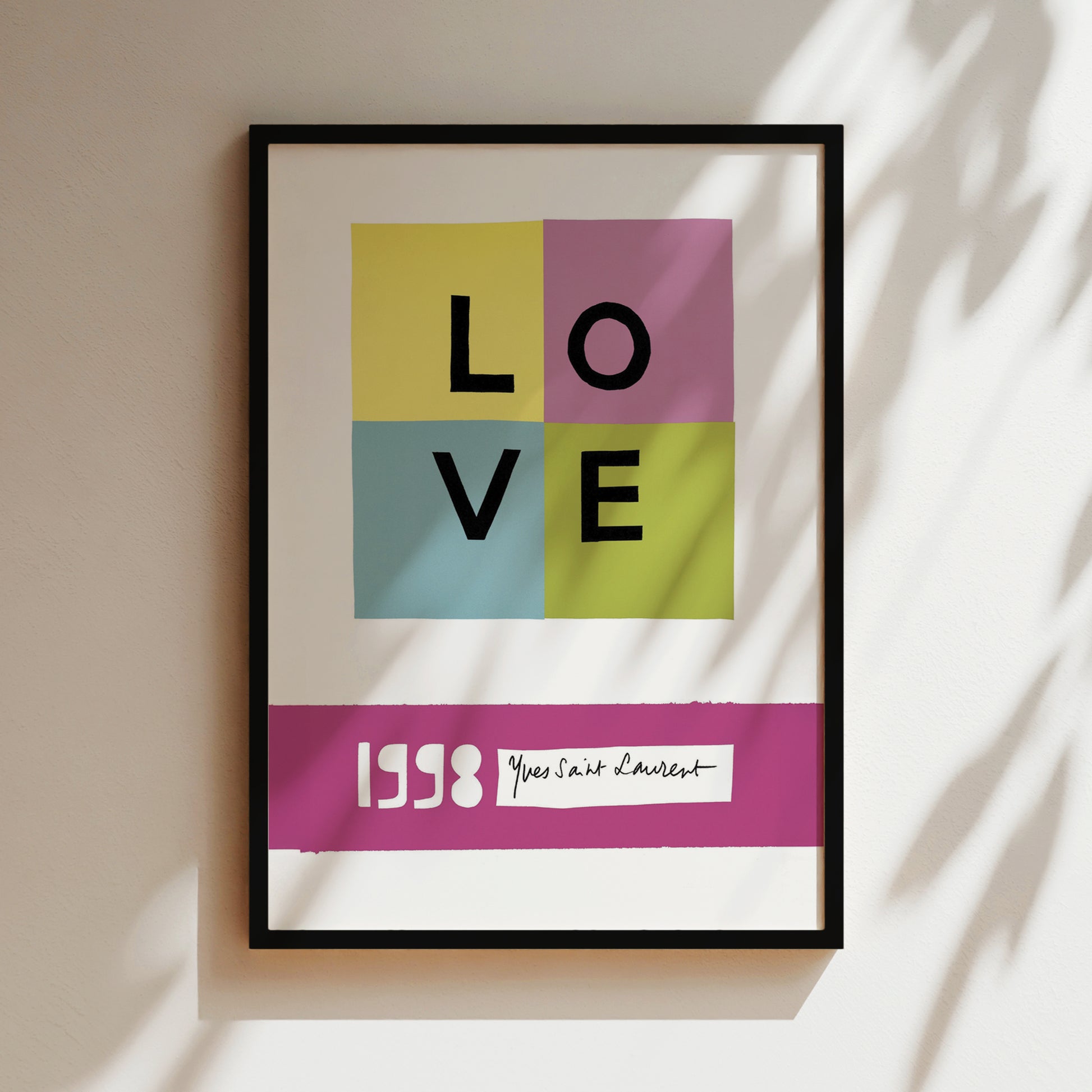 a framed poster with the word "LOVE" prominently displayed in the center.