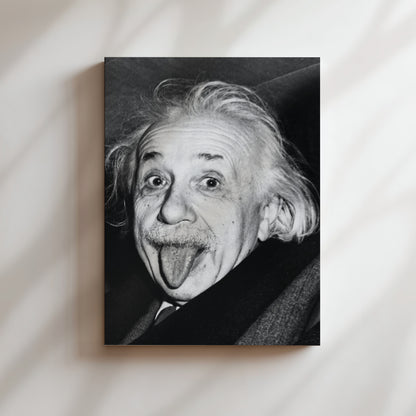 a black and white photo of an old man sticking his tongue out