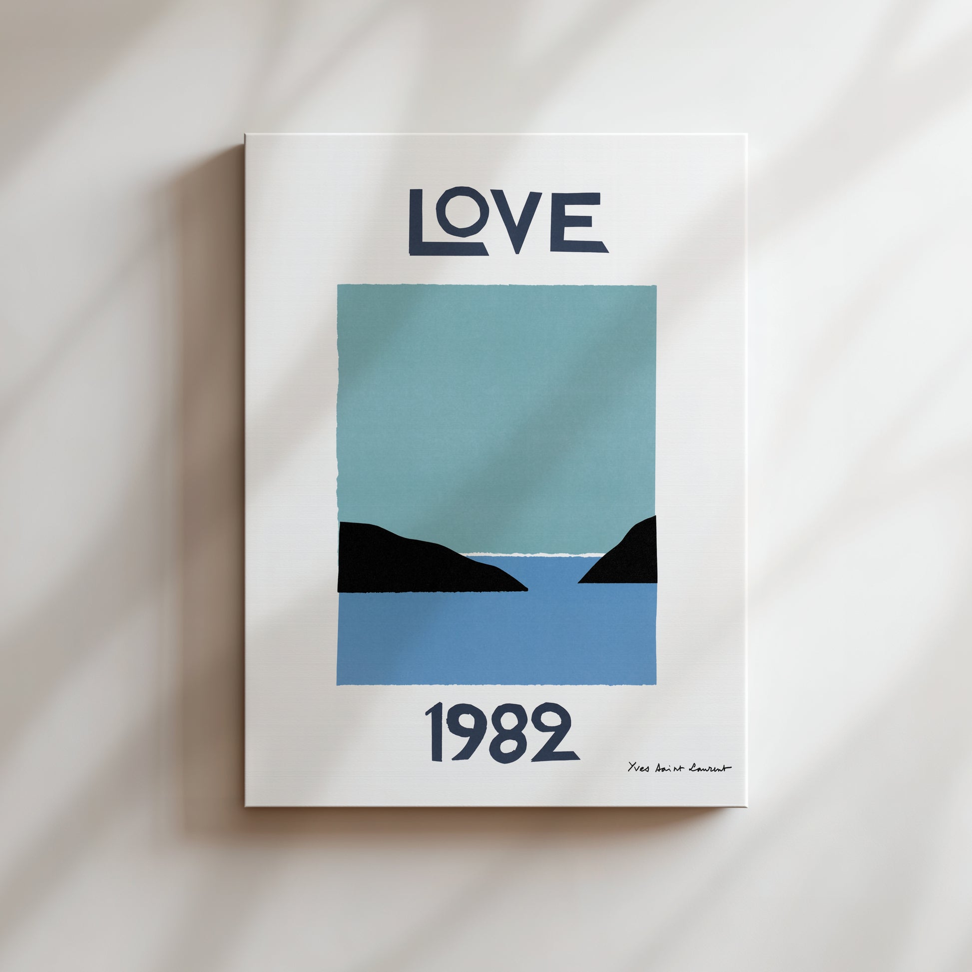 The image is a poster with a blue and black color scheme, featuring a landscape with mountains and a body of water. The text "LOVE" is prominently displayed at the top, and the year "1982" is shown at the bottom.