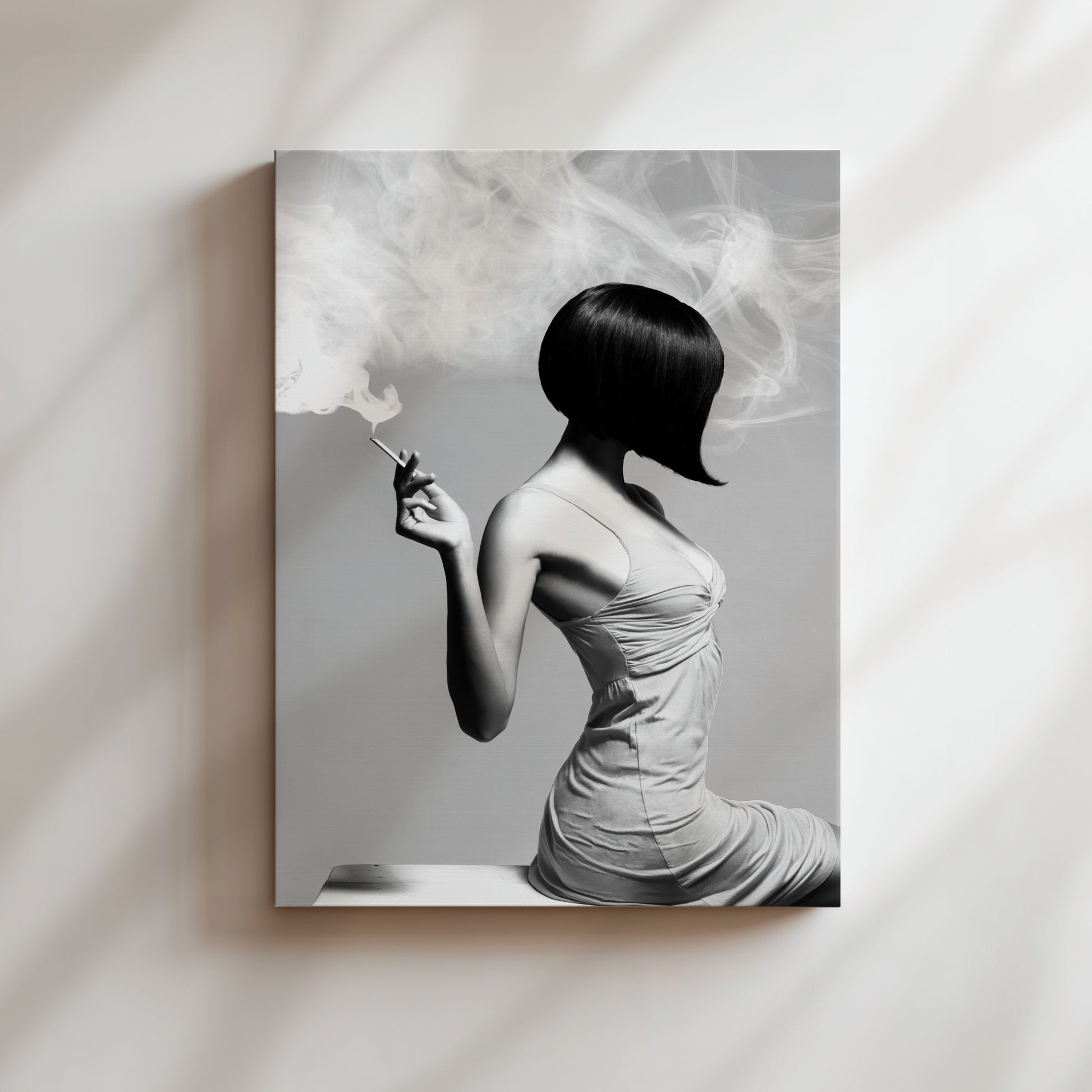 a black and white photo of a woman smoking a cigarette