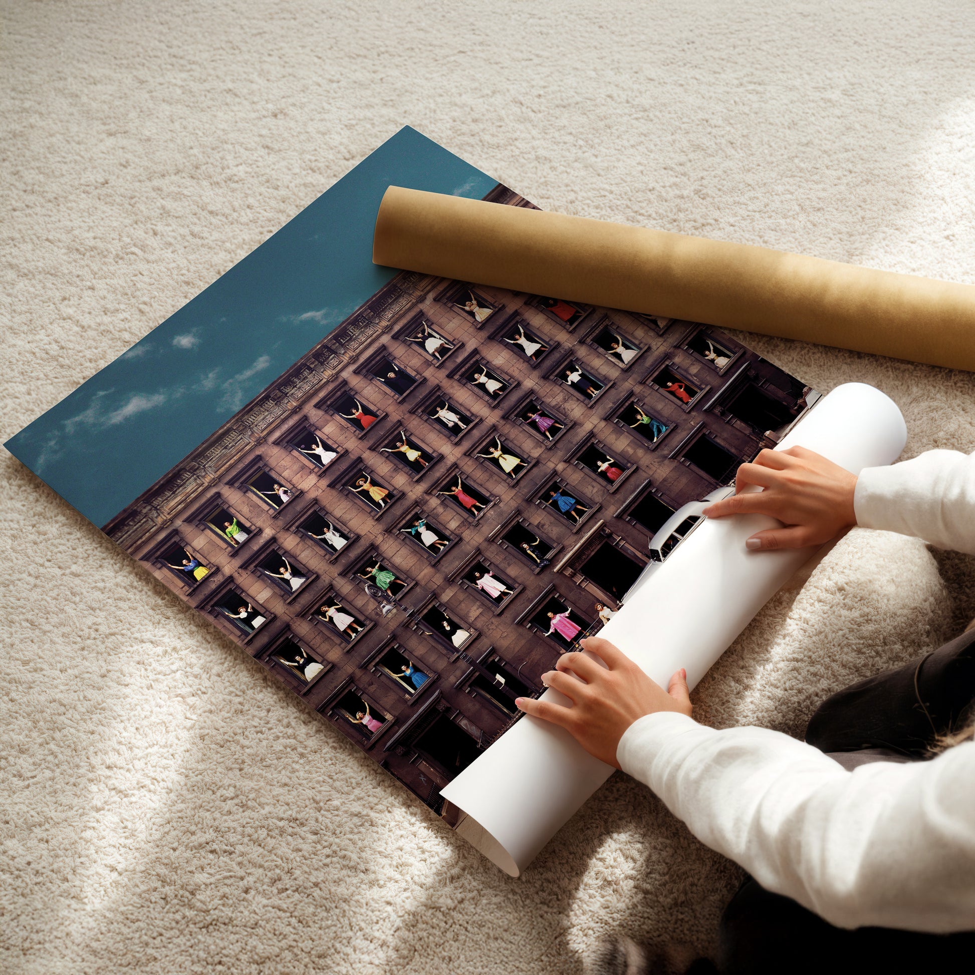 a child is playing with a roll of paper