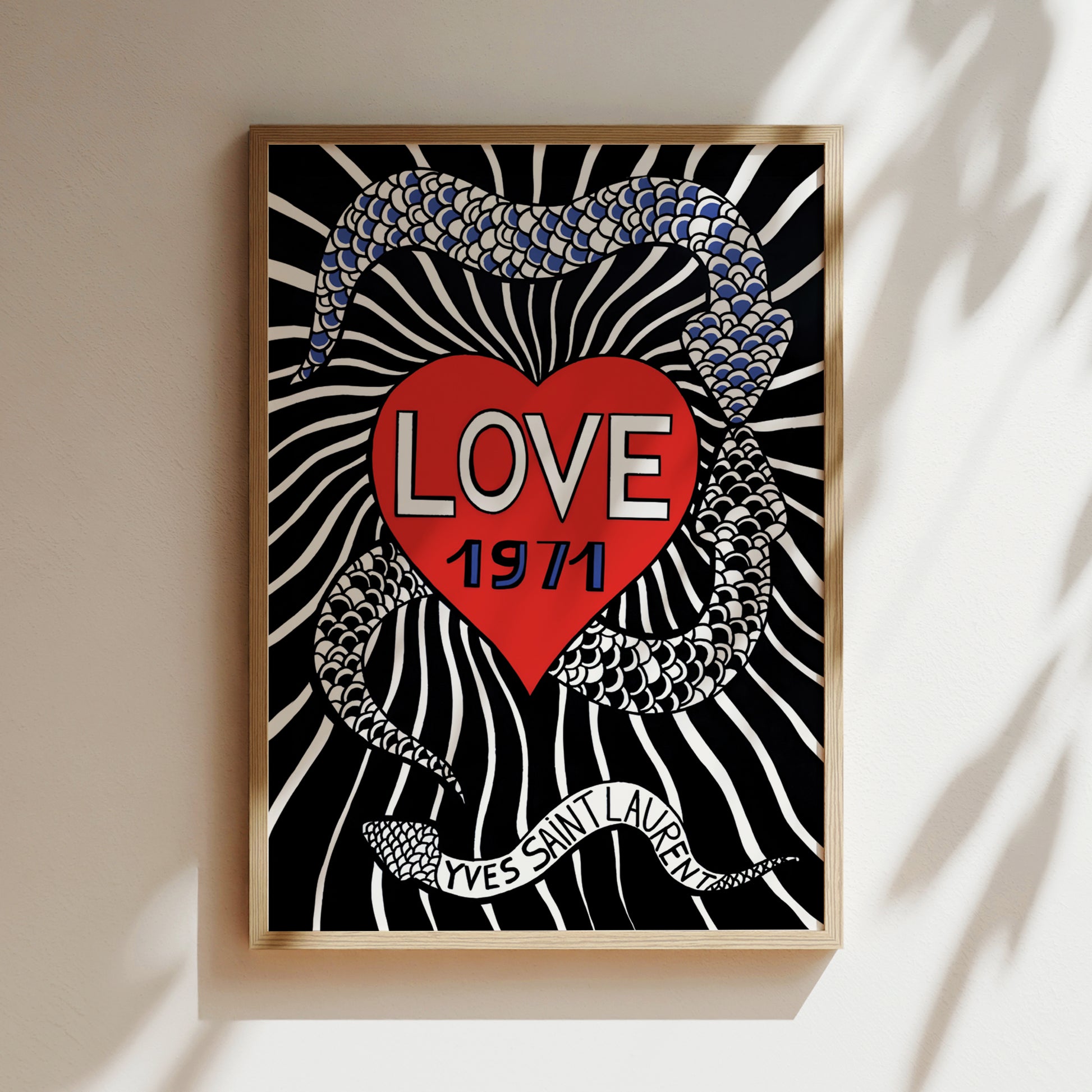 The image is a framed poster with a black and white zebra-like background, a red heart in the center, and a snake-like pattern on the left side. The text "LOVE 1971" is prominently displayed in the center of the poster.