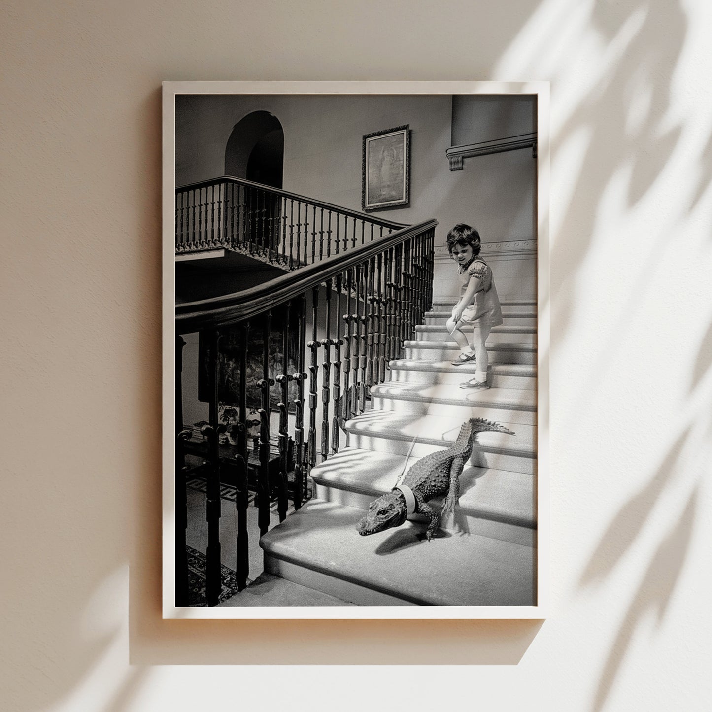 a black and white photo of a child and a dog