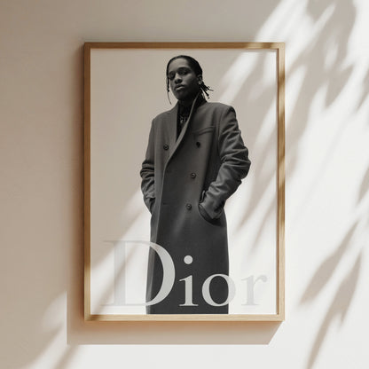A black and white photograph of a person wearing a coat, with the word "Dior" displayed below the image.