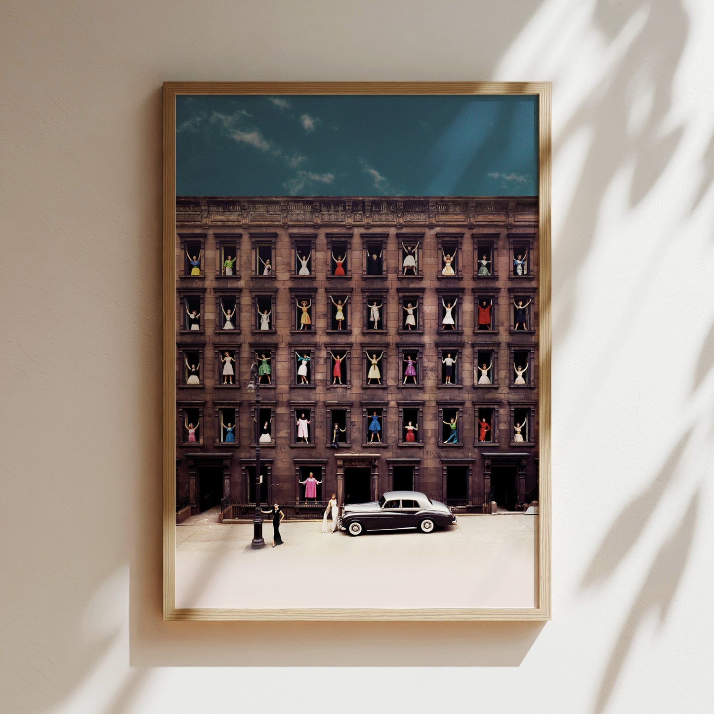 a picture of a building with a car parked in front of it