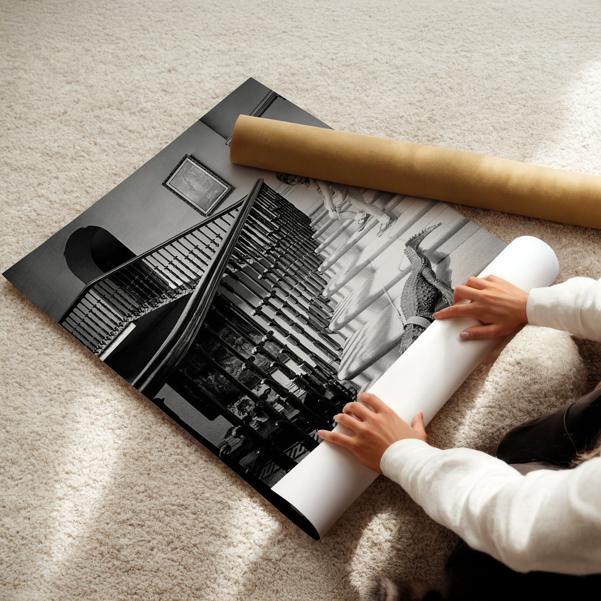 a child is holding a roll of paper on the floor