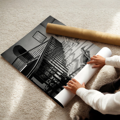 a child is holding a roll of paper on the floor