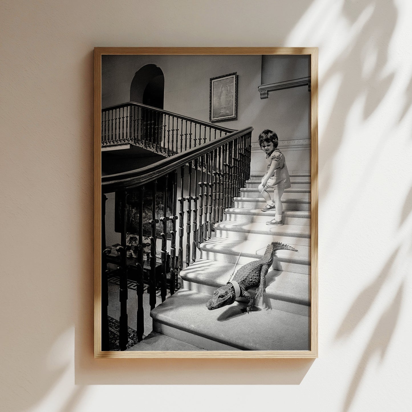 a black and white photo of a child and a dog