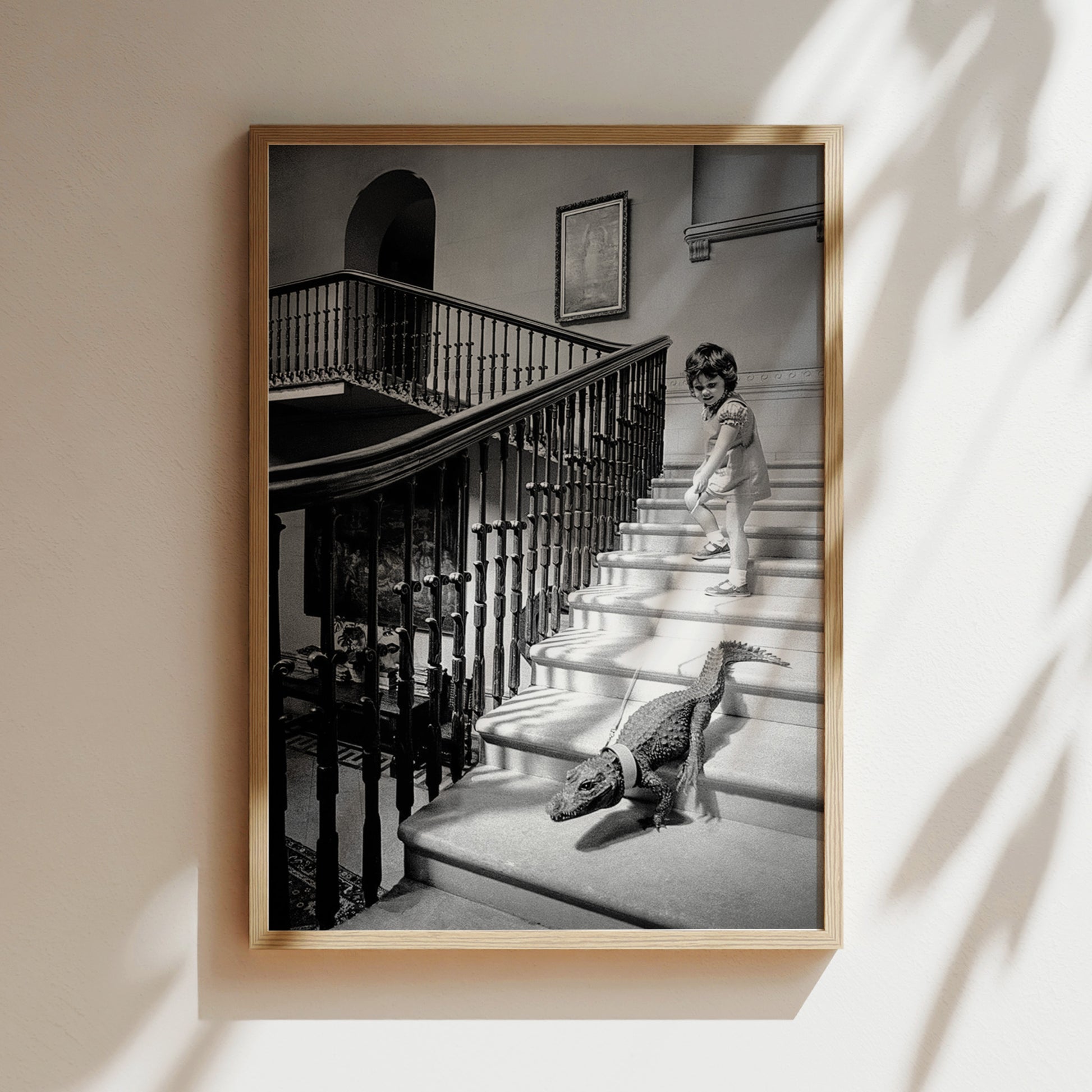 a black and white photo of a child and a dog