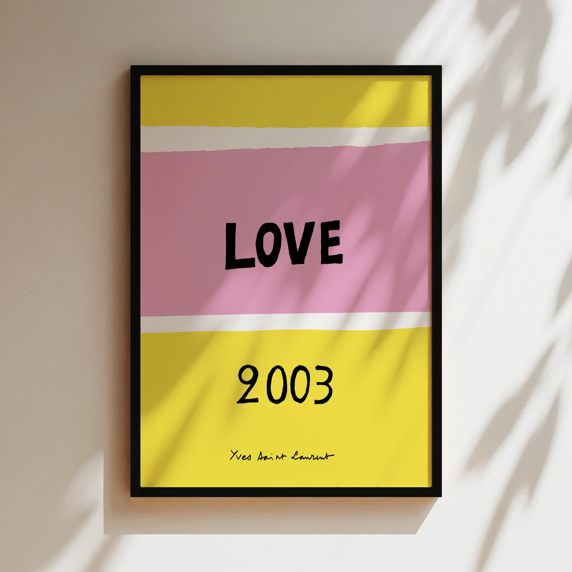 The image is a framed poster with a bold, colorful design featuring the word "LOVE" in large letters, with the year "2003" below it.